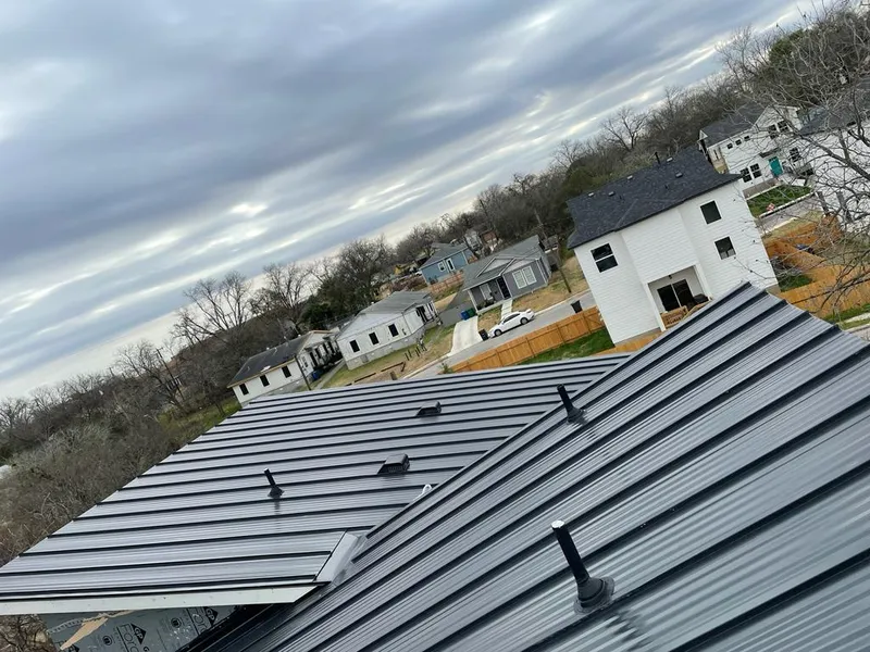 Standing seam metal roof panels with vents for Skylight Repair in Farmington